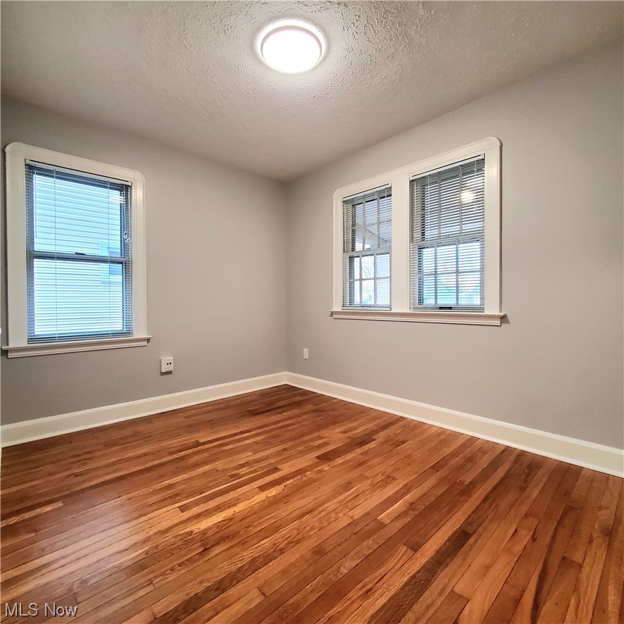 4348 Prasse Road South Euclid, OH 44121 - Photo 5 of 10 First-floor bedroom #1, with a refinished wood floor
