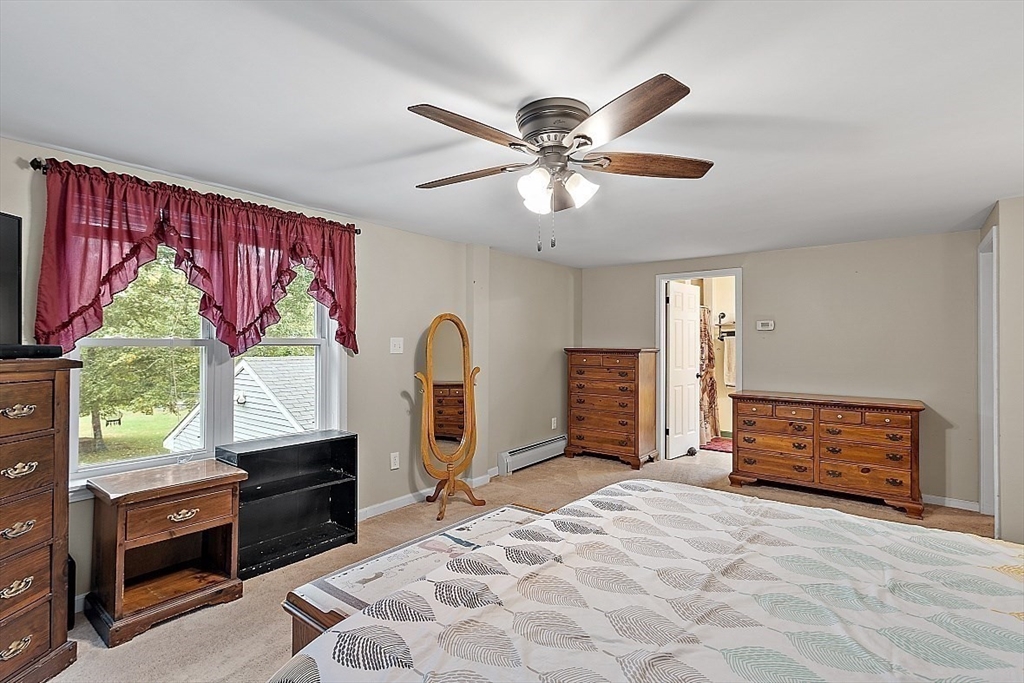 511 S Road Templeton, MA 01468 - Photo 16 of 33 a bedroom with a bed dresser and a window