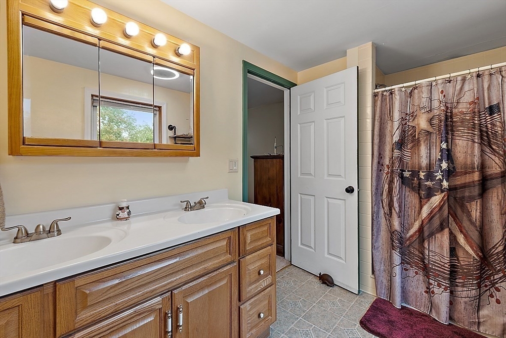 511 S Road Templeton, MA 01468 - Photo 17 of 33 a bathroom with a sink and a mirror