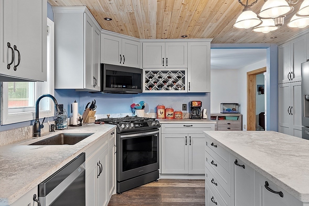 511 S Road Templeton, MA 01468 - Photo 3 of 33 a kitchen with stainless steel appliances granite countertop a sink stove and cabinets