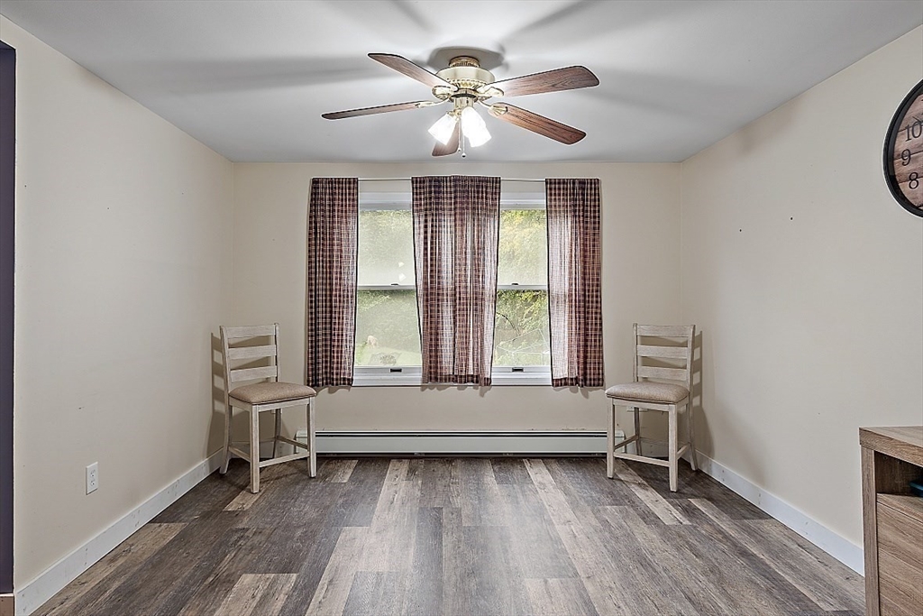 511 S Road Templeton, MA 01468 - Photo 9 of 33 wooden floor that has a window and a chair in it