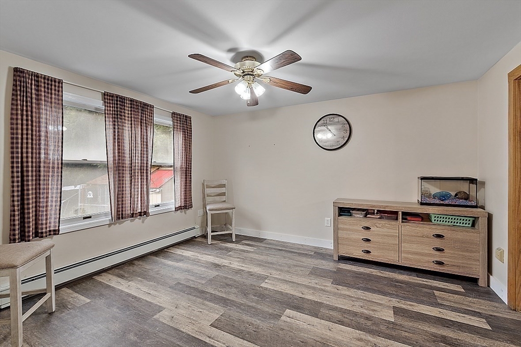 511 S Road Templeton, MA 01468 - Photo 10 of 33 a view of a livingroom with furniture and a ceiling fan