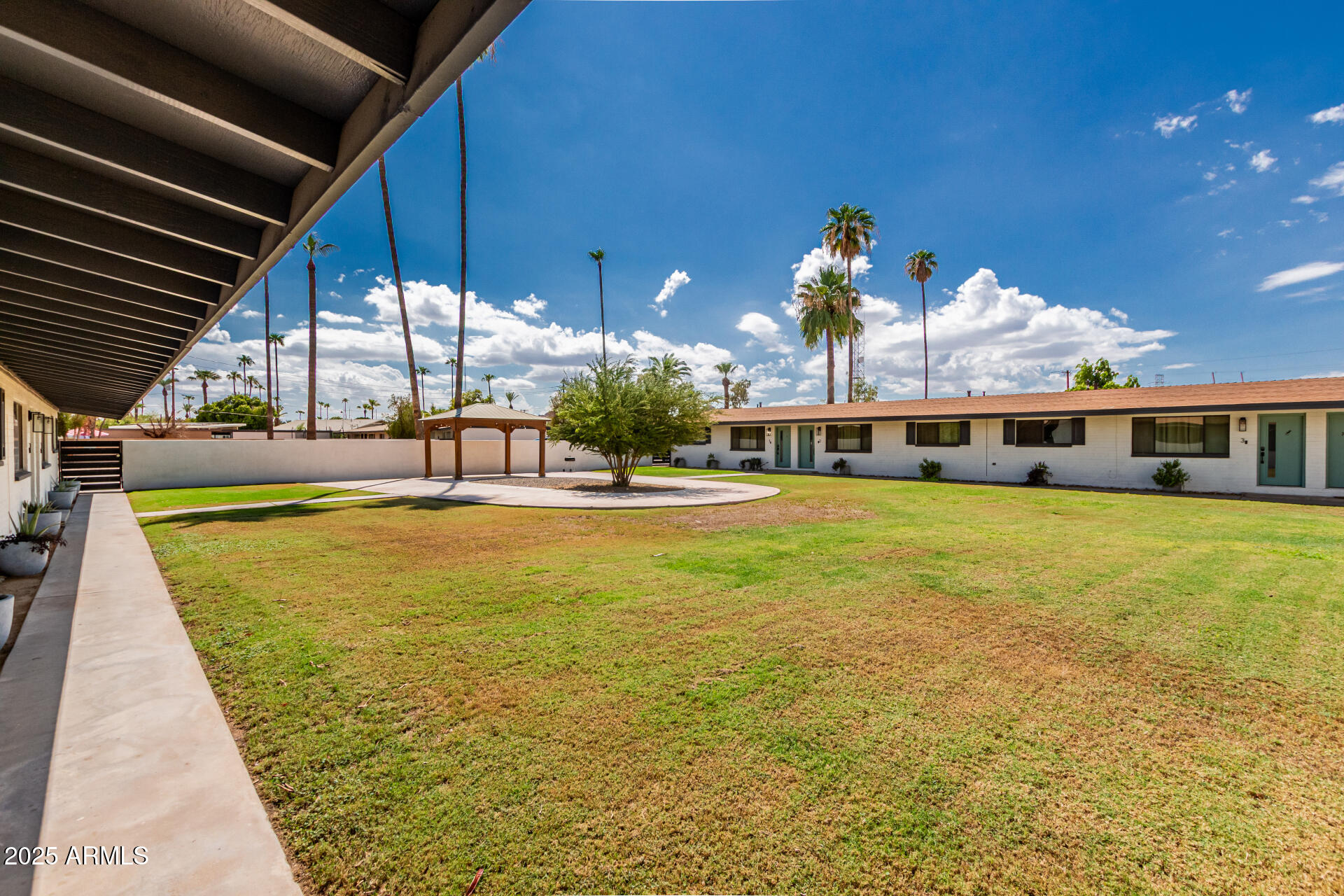 6628 East Avalon Drive, Unit 1 Scottsdale, AZ 85251 - Photo 27 of 29 a view of a swimming pool with an outdoor space