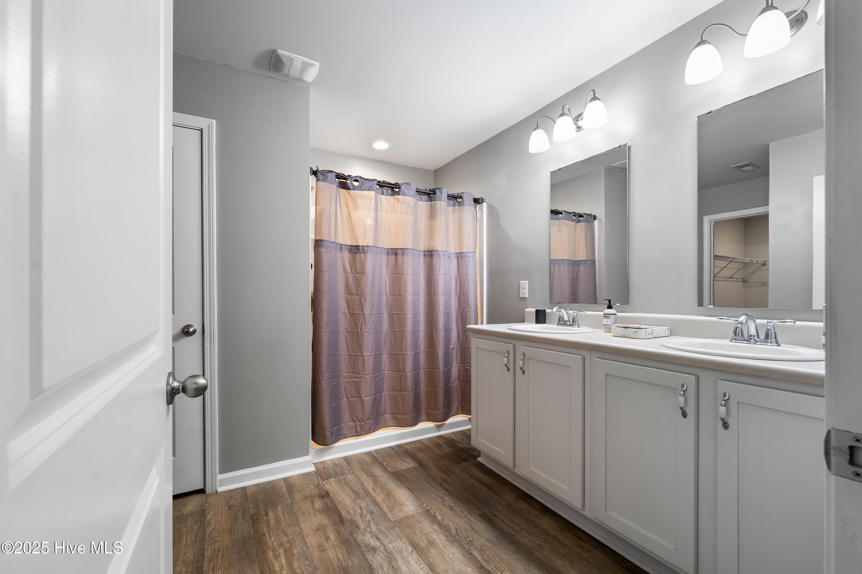 430 Ellis Road Southeast, Unit LOT #55 Bolivia, NC 28422 - Photo 53 of 111 Primary bathroom is spacious with dual sinks and vanities, walk in shower & water closet