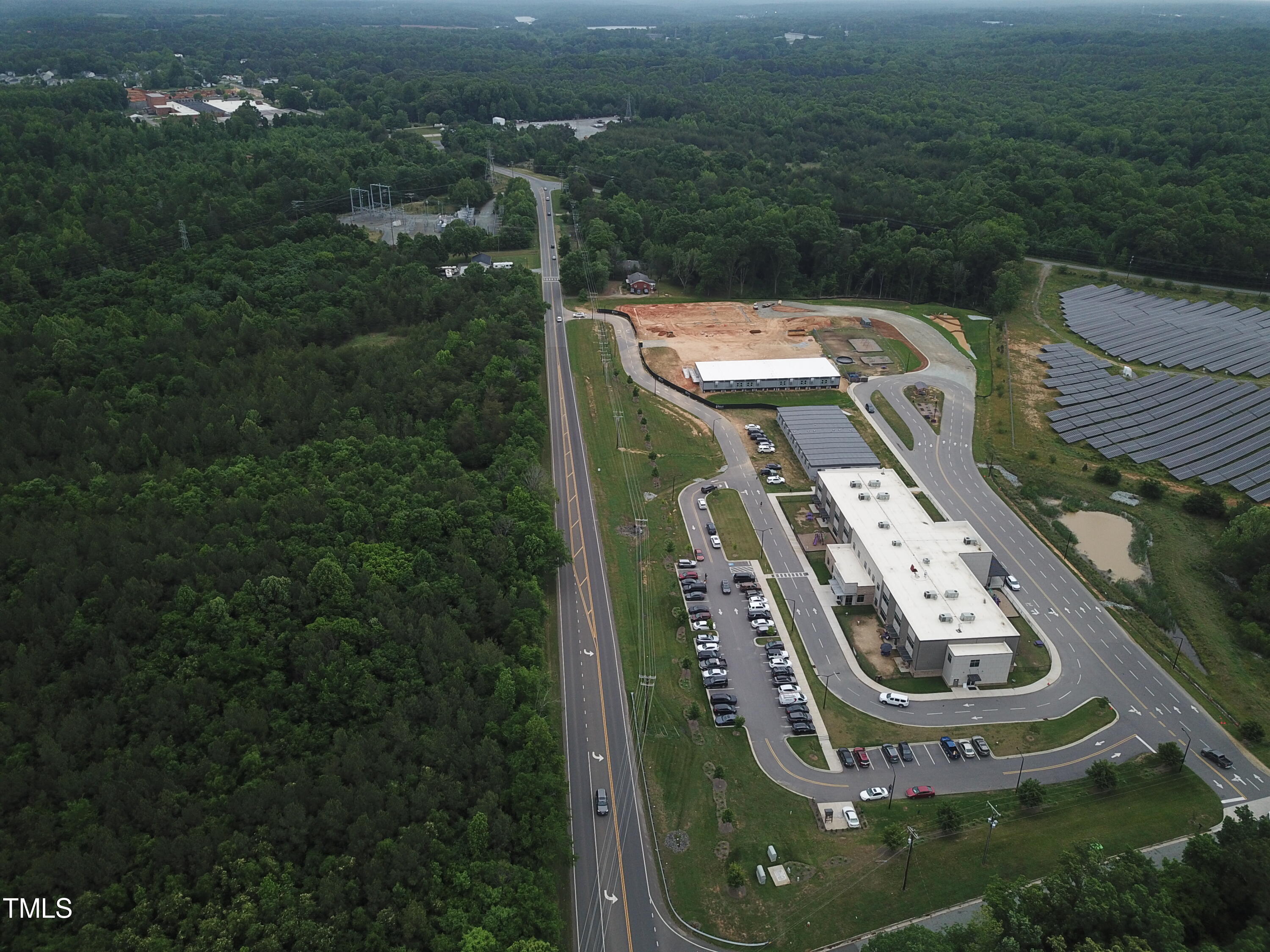 908 Jimmie Kerr Road Graham, NC 27258 - Photo 15 of 15 an aerial view of a house