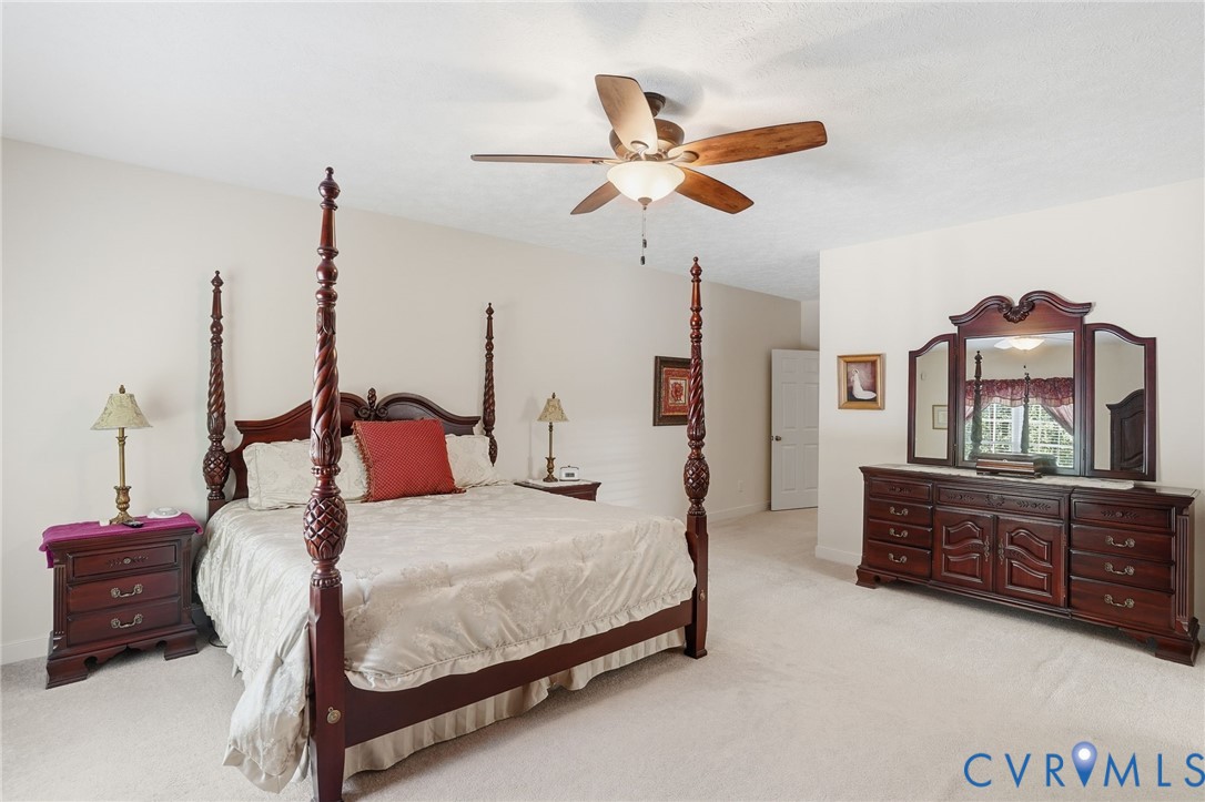 3600 Market Road Mechanicsville, VA 23111 - Photo 28 of 67 a bedroom with a bed and ceiling fan
