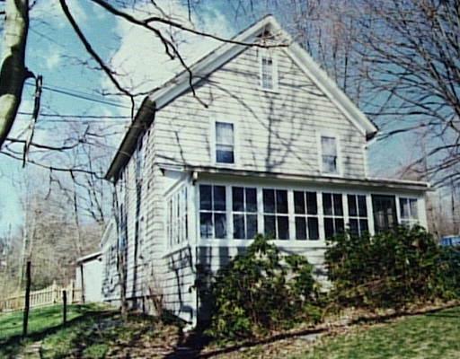 a house view with a garden space