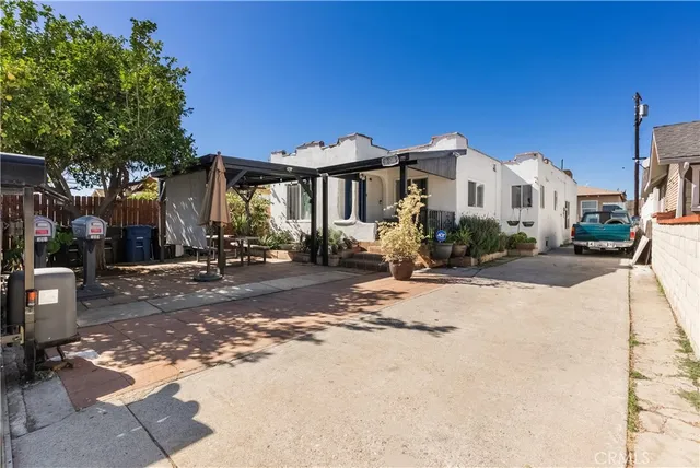 a front view of a house with a patio