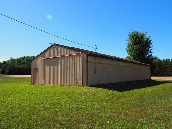$169,900 | 4106 Waug Road, Benzonia, MI 49616