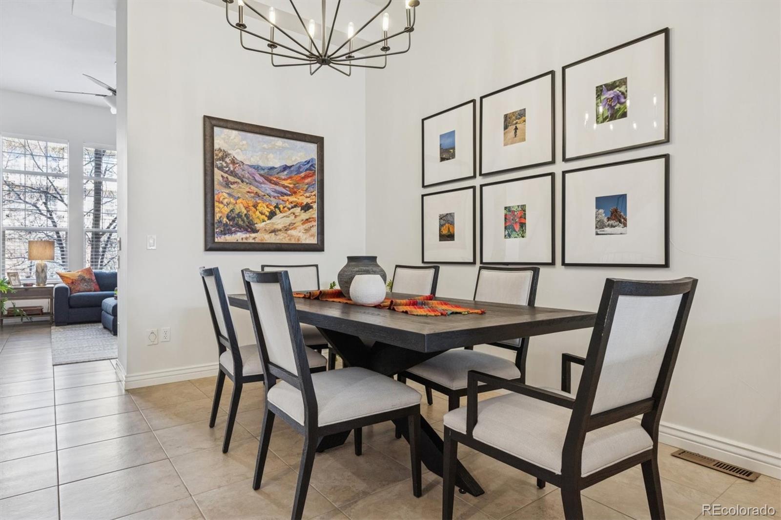 10130 Inverness Main Street Englewood, CO 80112 - Photo 4 of 44 a view of a dining room that has a table and chairs