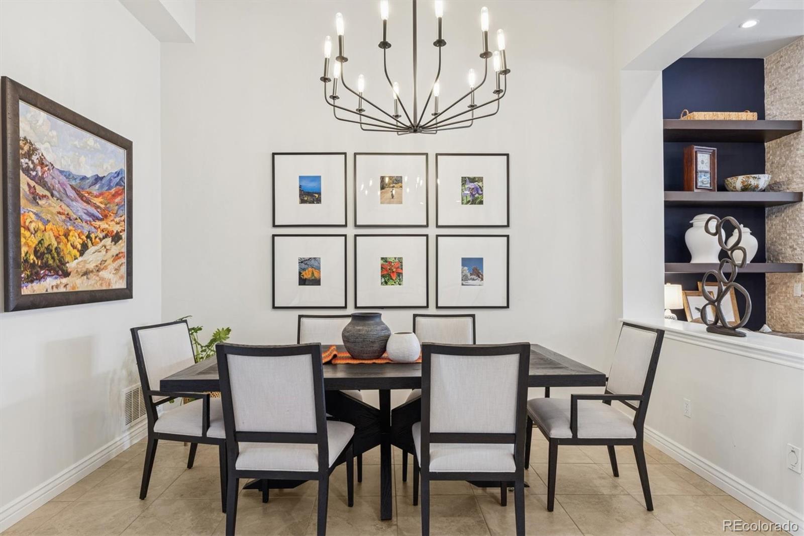 10130 Inverness Main Street Englewood, CO 80112 - Photo 5 of 44 a view of a dining room with furniture