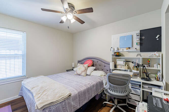 213 Chandler Crossing Trail Round Rock, TX 78665 - Photo 22 of 34 Bedroom featuring ceiling fan and wood finished floors
