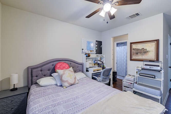 213 Chandler Crossing Trail Round Rock, TX 78665 - Photo 23 of 34 Bedroom with ceiling fan and dark wood finished floors