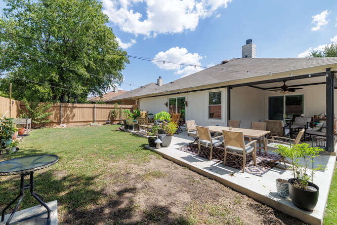 213 Chandler Crossing Trail Round Rock, TX 78665 - Photo 29 of 34 Fenced backyard with a patio area and ceiling fan