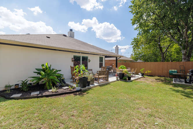 213 Chandler Crossing Trail Round Rock, TX 78665 - Photo 31 of 34 Fenced yard with a patio