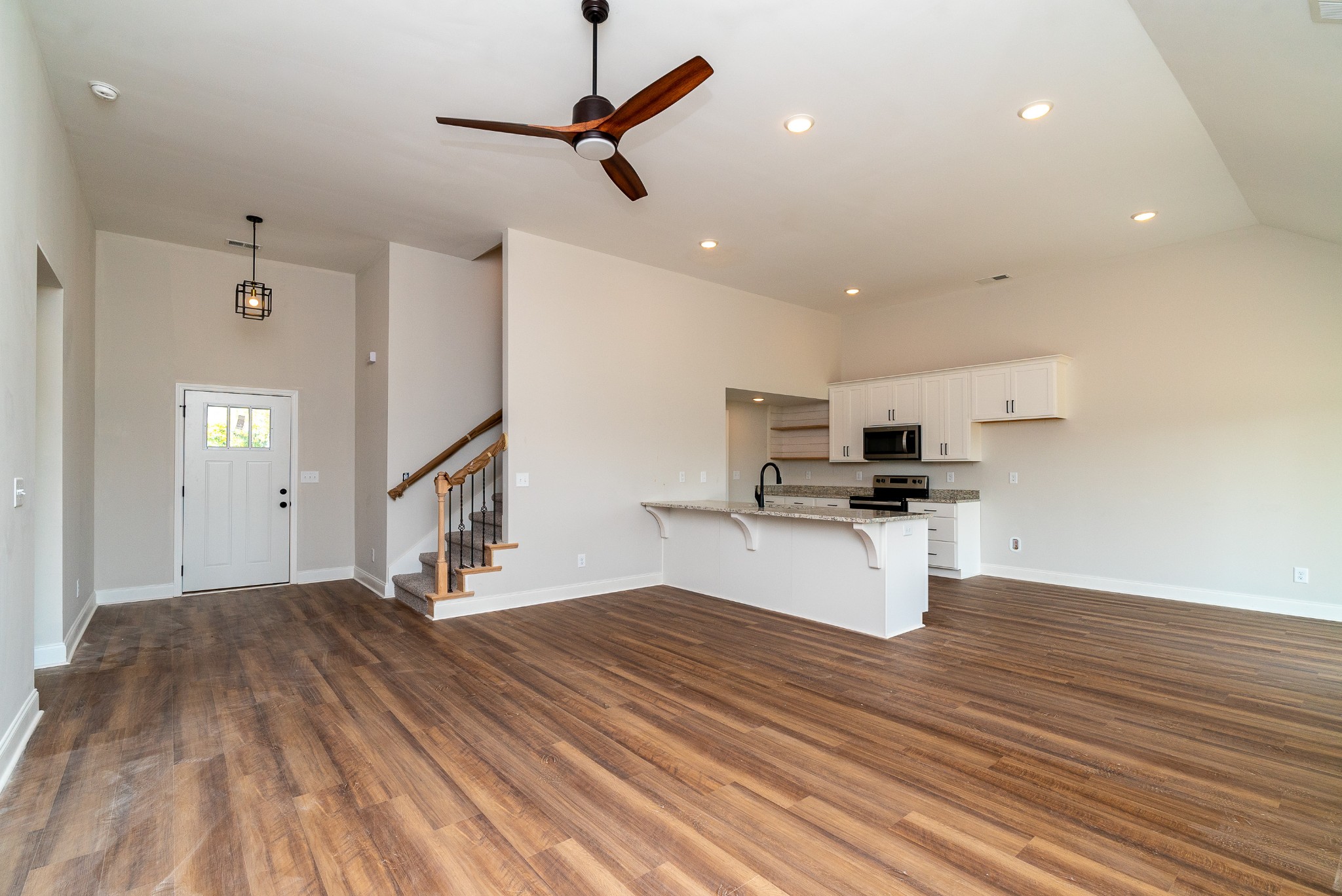4144 Dot Road Springfield, TN 37172 - Photo 18 of 52 a view of empty room with wooden floor and ceiling fan