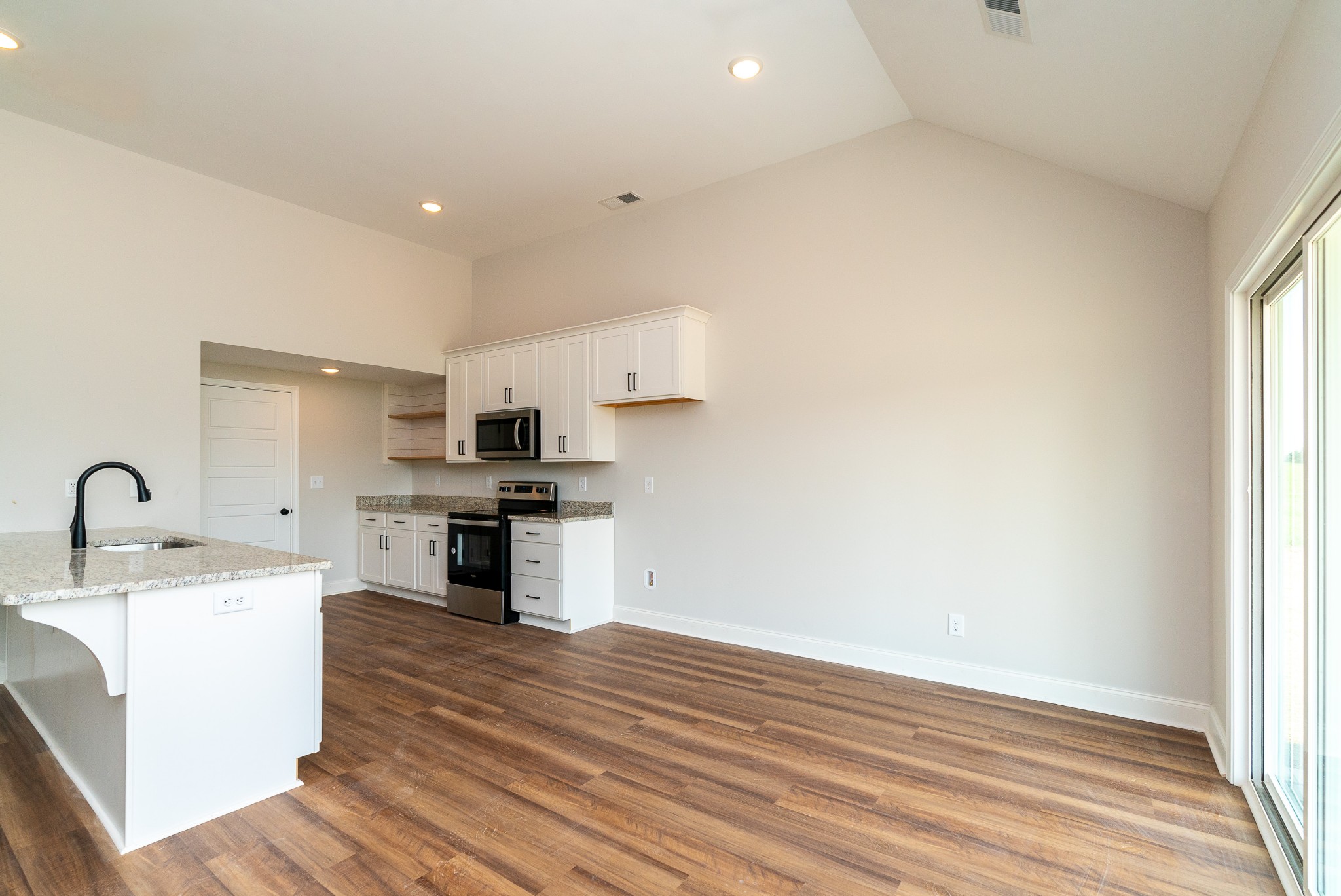 4144 Dot Road Springfield, TN 37172 - Photo 21 of 52 a kitchen with a sink and a stove top oven