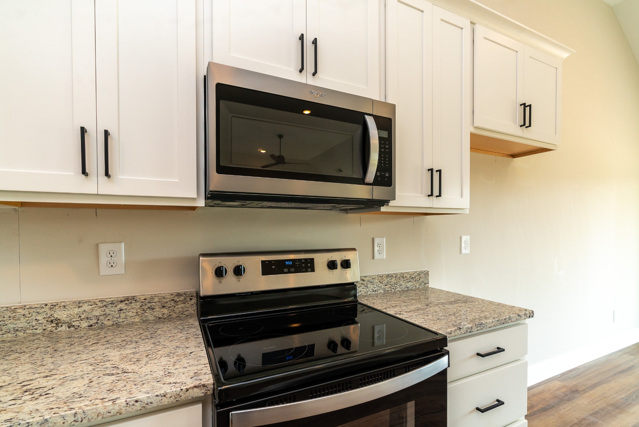 4144 Dot Road Springfield, TN 37172 - Photo 27 of 52 a kitchen with granite countertop a stove and a microwave