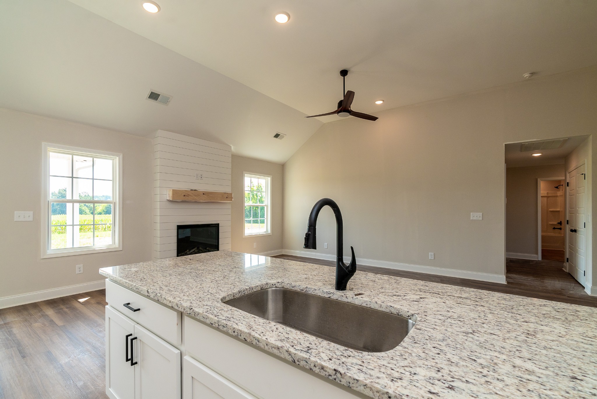 4144 Dot Road Springfield, TN 37172 - Photo 28 of 52 a kitchen with granite countertop a sink and a stove