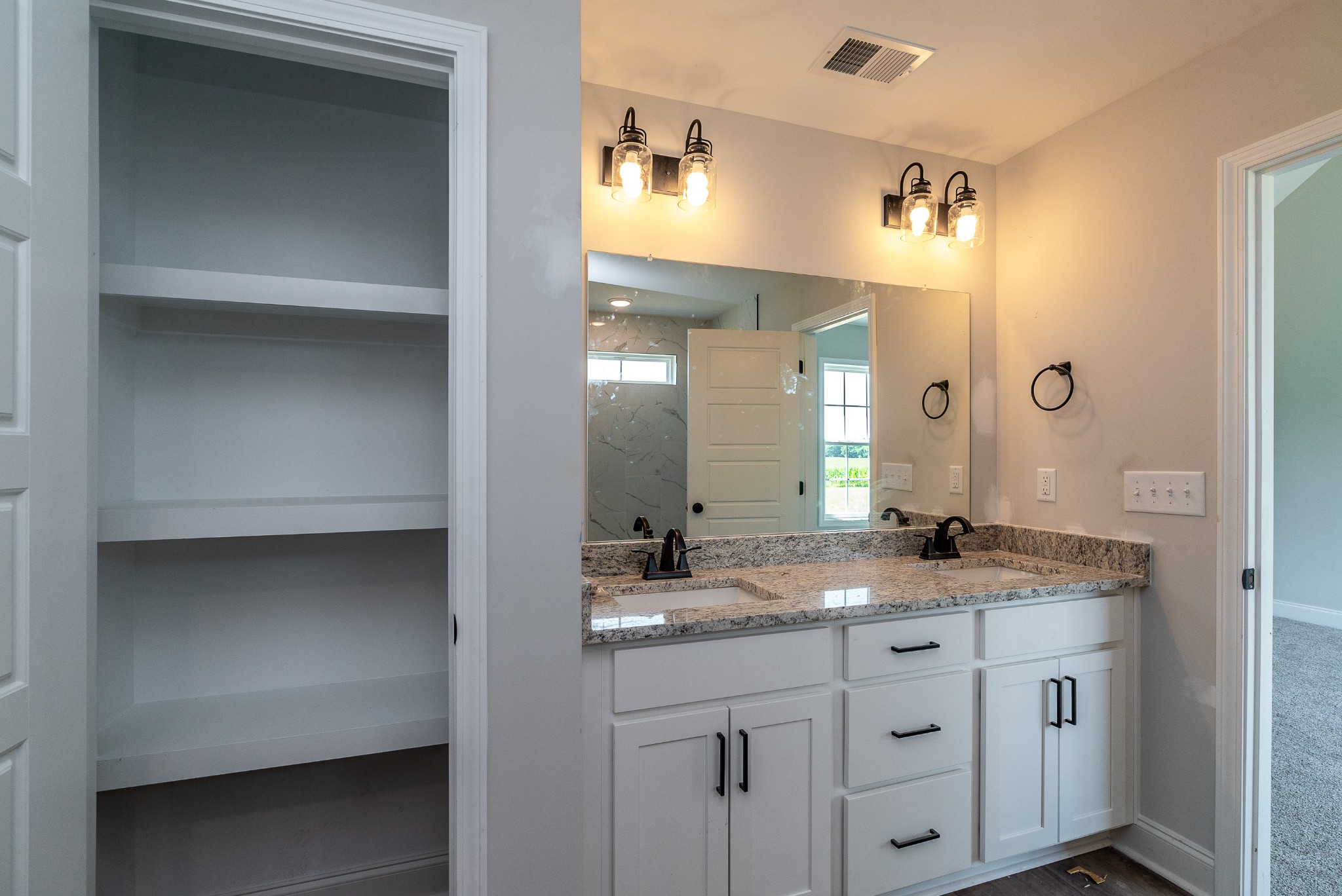 4144 Dot Road Springfield, TN 37172 - Photo 36 of 52 a bathroom with a granite countertop sink and a mirror