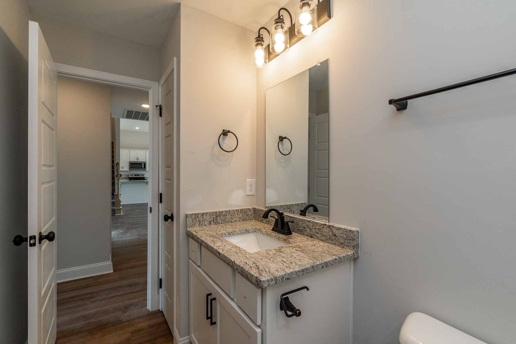 4144 Dot Road Springfield, TN 37172 - Photo 40 of 52 a bathroom with a granite countertop sink and a mirror