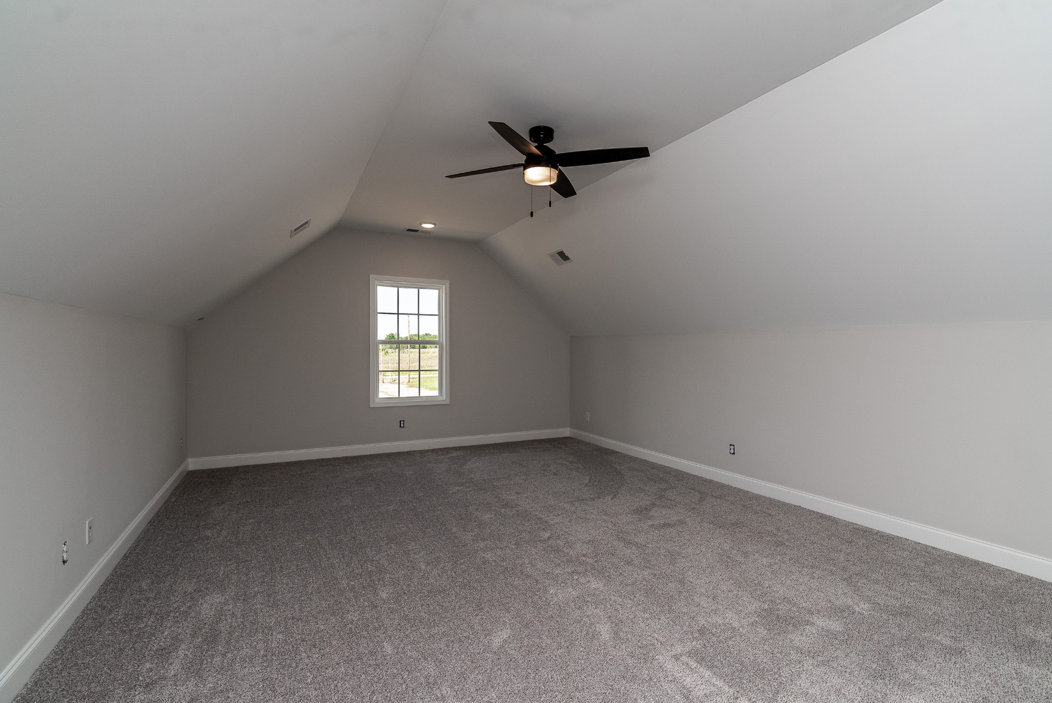 4144 Dot Road Springfield, TN 37172 - Photo 50 of 52 an empty room with a window and a fan