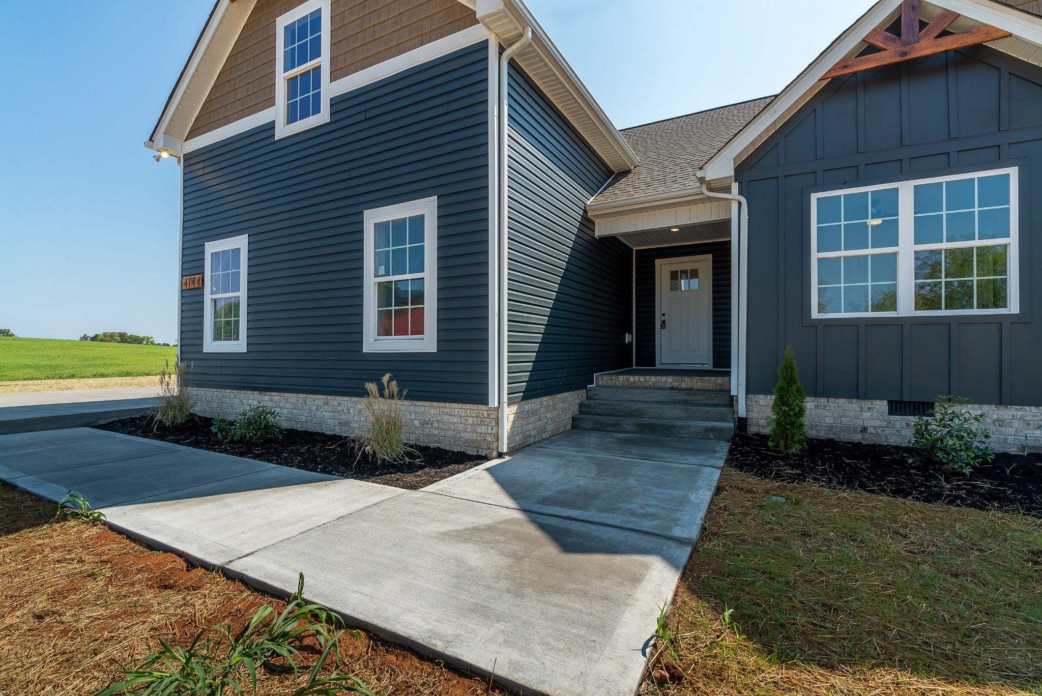 4144 Dot Road Springfield, TN 37172 - Photo 5 of 52 a front view of a house with garden
