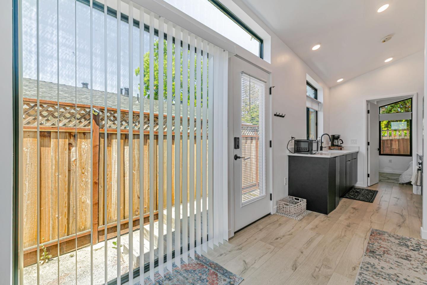 1555 Washington Street Santa Clara, CA 95050 - Photo 12 of 19 a view of a hallway with wooden floor and furniture