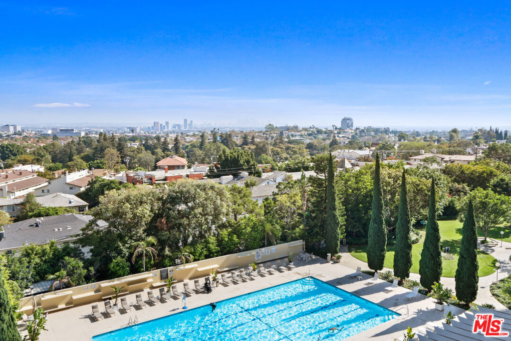 2160 Century Hill, Unit 605 Los Angeles, CA 90067 - Photo 2 of 18 a view of a terrace with a garden and trees