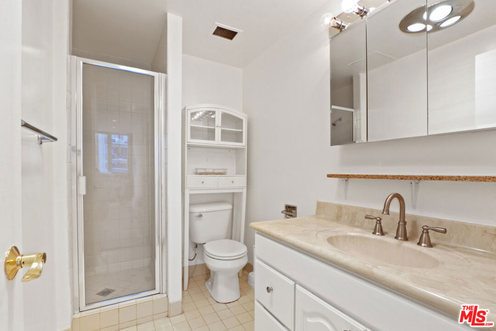 2160 Century Hill, Unit 605 Los Angeles, CA 90067 - Photo 8 of 18 a bathroom with a toilet sink and shower