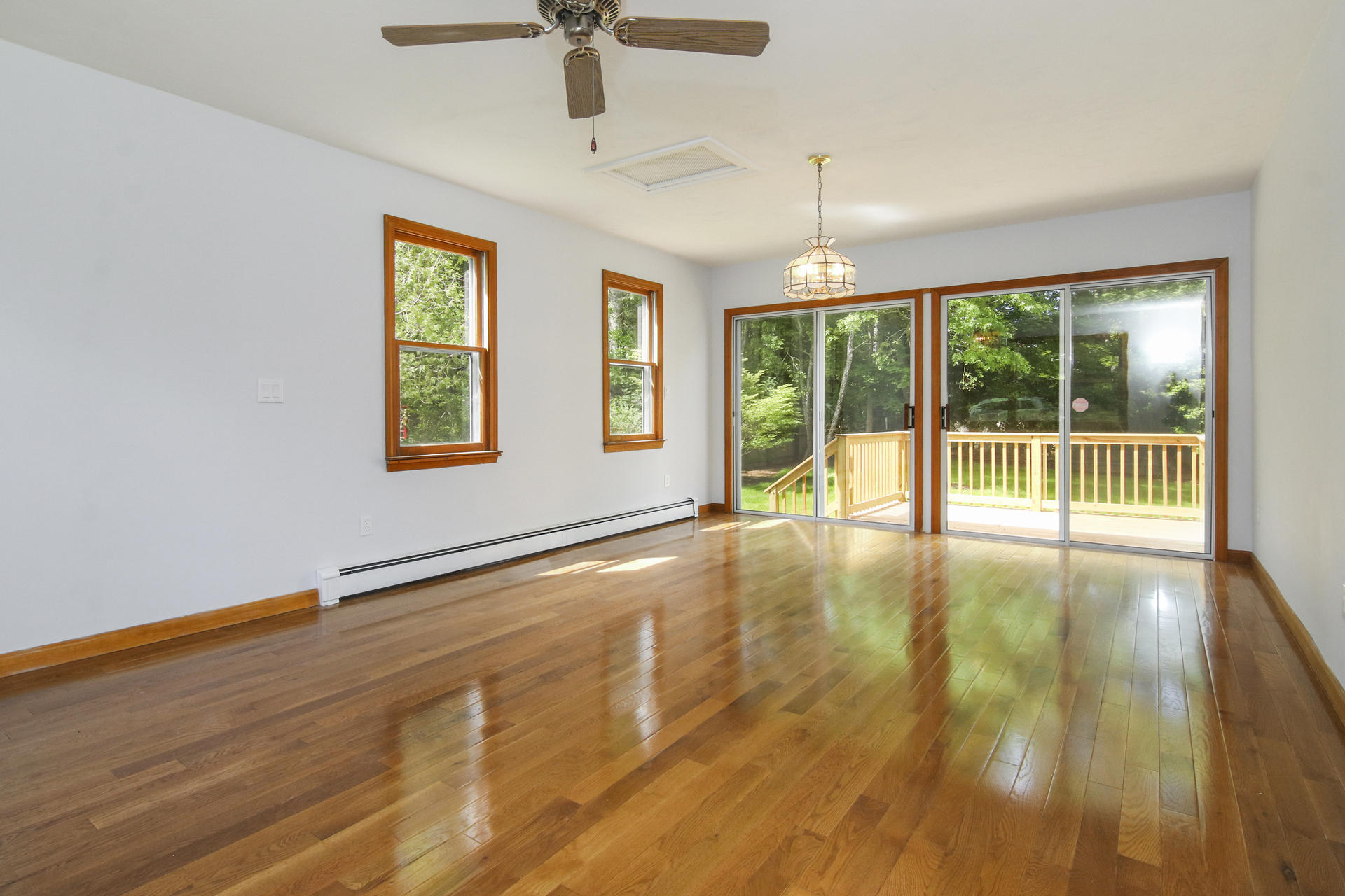725 Old Stage Road Centerville, MA 02632 - Photo 11 of 53 a view of an empty room with a window