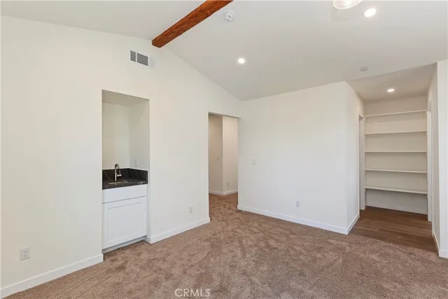 a bathroom with a toilet and shower