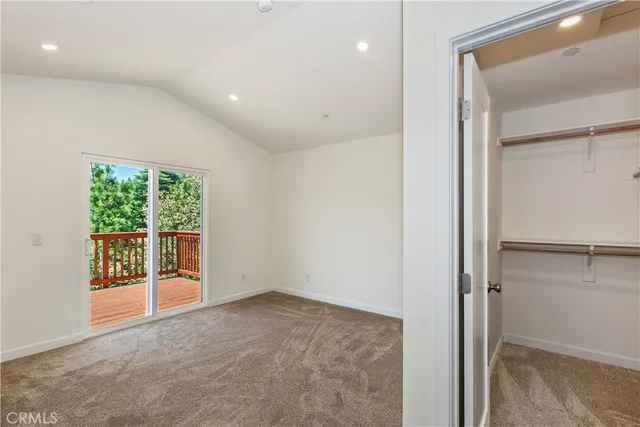 an empty room with a bathroom