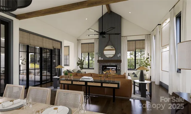 a living room with fireplace furniture and a flat screen tv