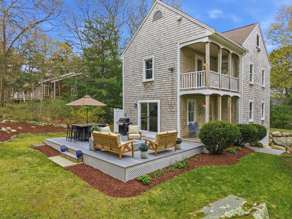 55 Ridgeview Drive Falmouth, MA 02540 - Photo 2 of 32 a front view of a house with garden