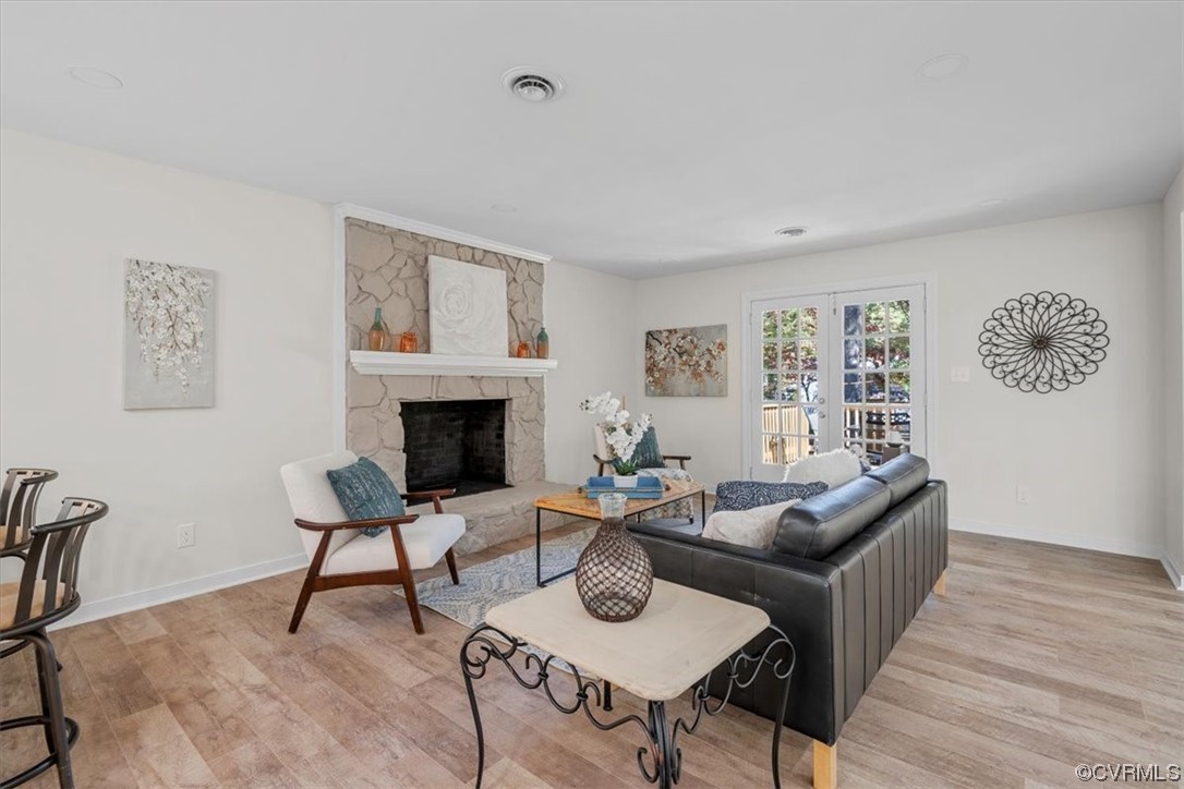 13109 Bluemont Road Chester, VA 23831 - Photo 13 of 50 a living room with furniture a rug and a fireplace