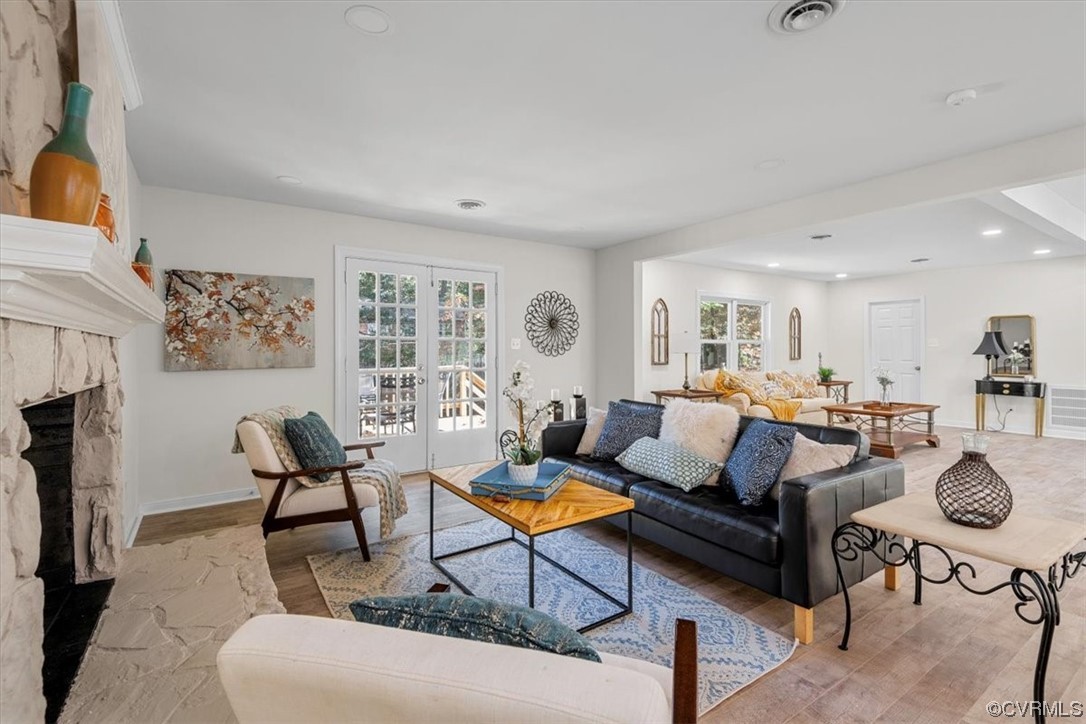 13109 Bluemont Road Chester, VA 23831 - Photo 14 of 50 a living room with furniture a fireplace and white walls