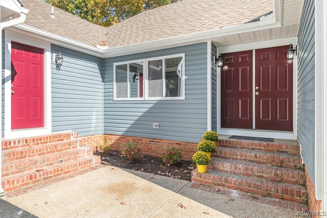 13109 Bluemont Road Chester, VA 23831 - Photo 2 of 50 a front view of a house with a garage