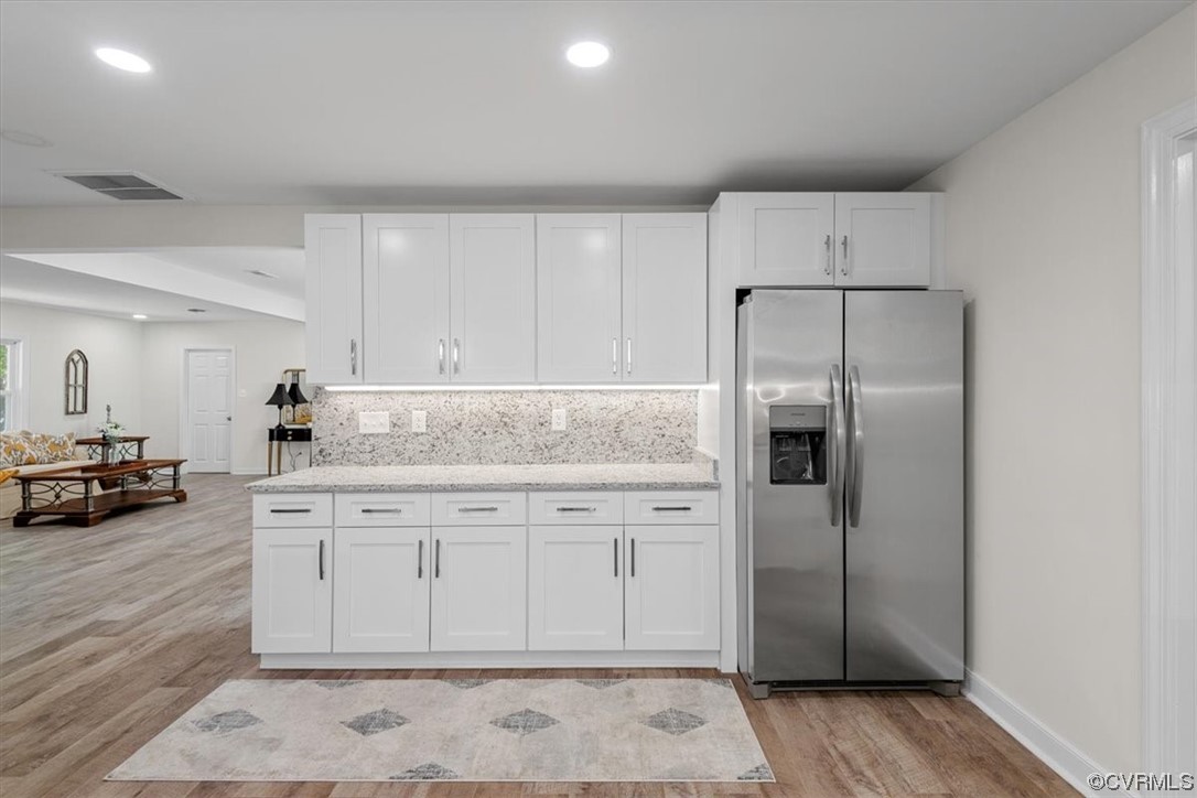 13109 Bluemont Road Chester, VA 23831 - Photo 22 of 50 a kitchen with stainless steel appliances a refrigerator sink and cabinets