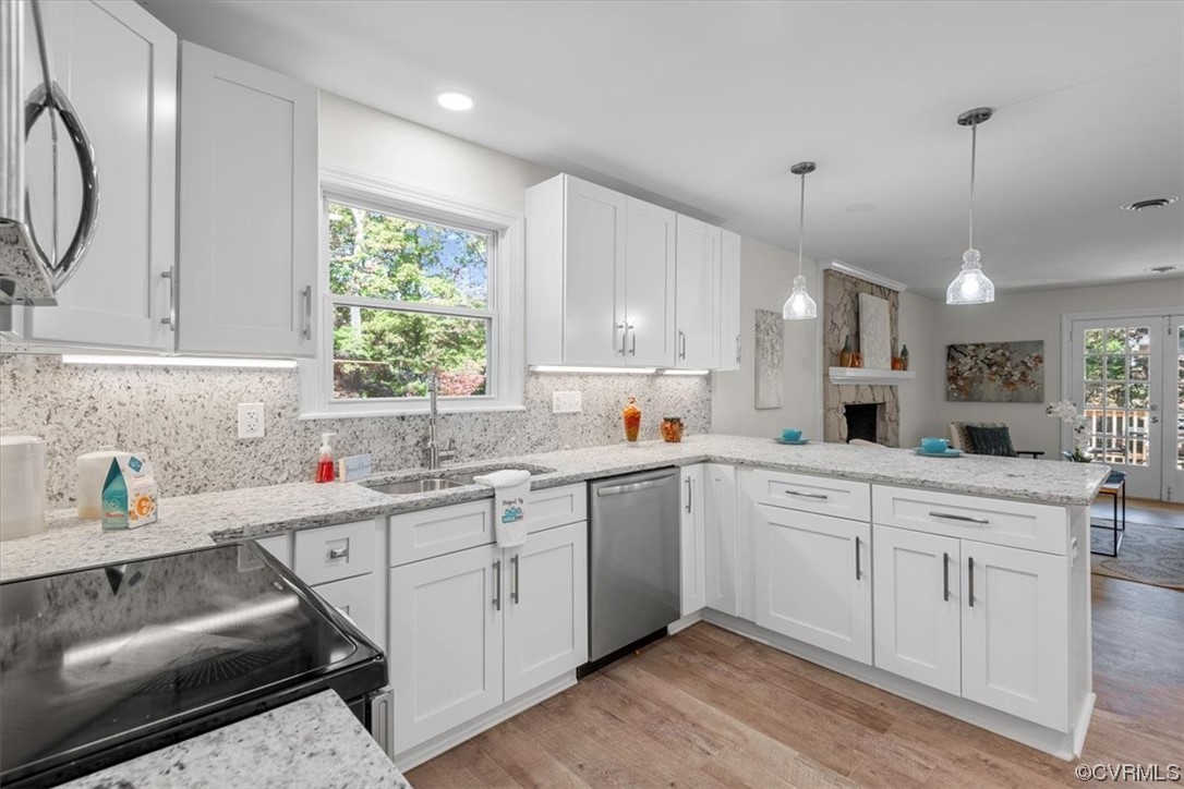 13109 Bluemont Road Chester, VA 23831 - Photo 23 of 50 a kitchen with a sink stove and cabinets