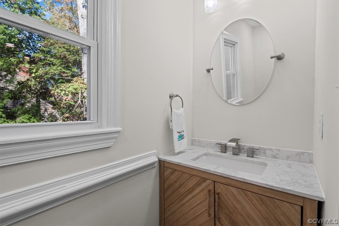 13109 Bluemont Road Chester, VA 23831 - Photo 28 of 50 a bathroom with a sink and a mirror