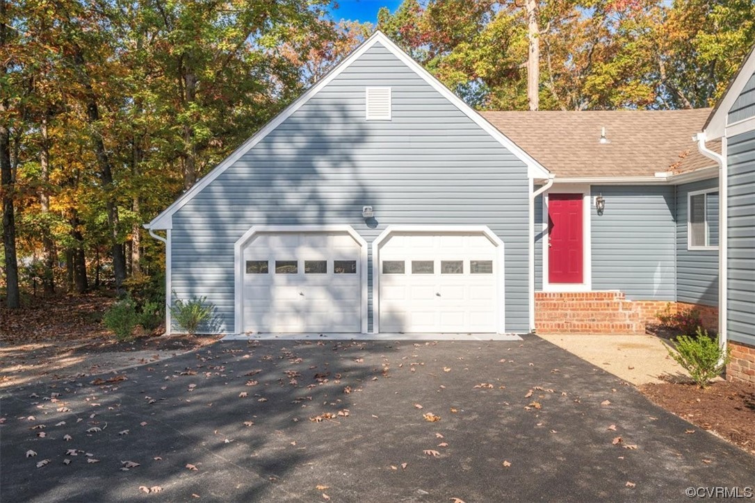 13109 Bluemont Road Chester, VA 23831 - Photo 3 of 50 a view of a house with a yard and garage