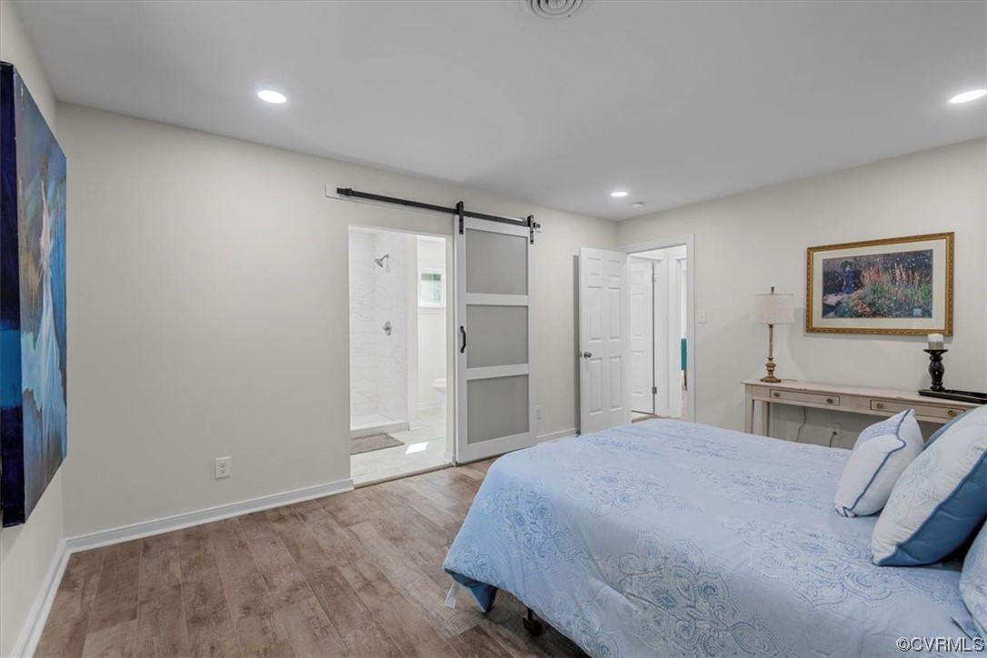 13109 Bluemont Road Chester, VA 23831 - Photo 34 of 50 a bedroom with a bed and a walk in closet