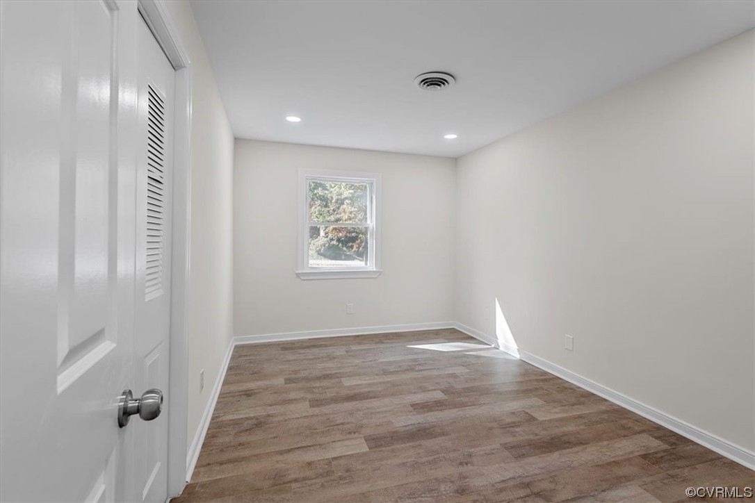 13109 Bluemont Road Chester, VA 23831 - Photo 41 of 50 wooden floor in an empty room with a window