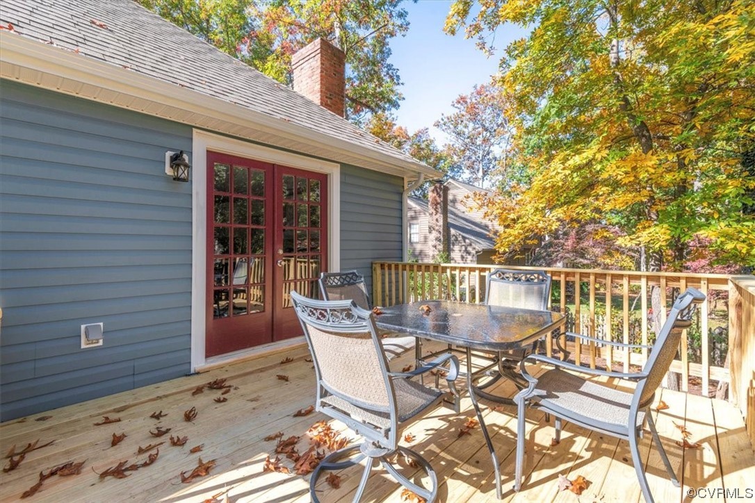 13109 Bluemont Road Chester, VA 23831 - Photo 49 of 50 a patio with table and chairs and potted plants