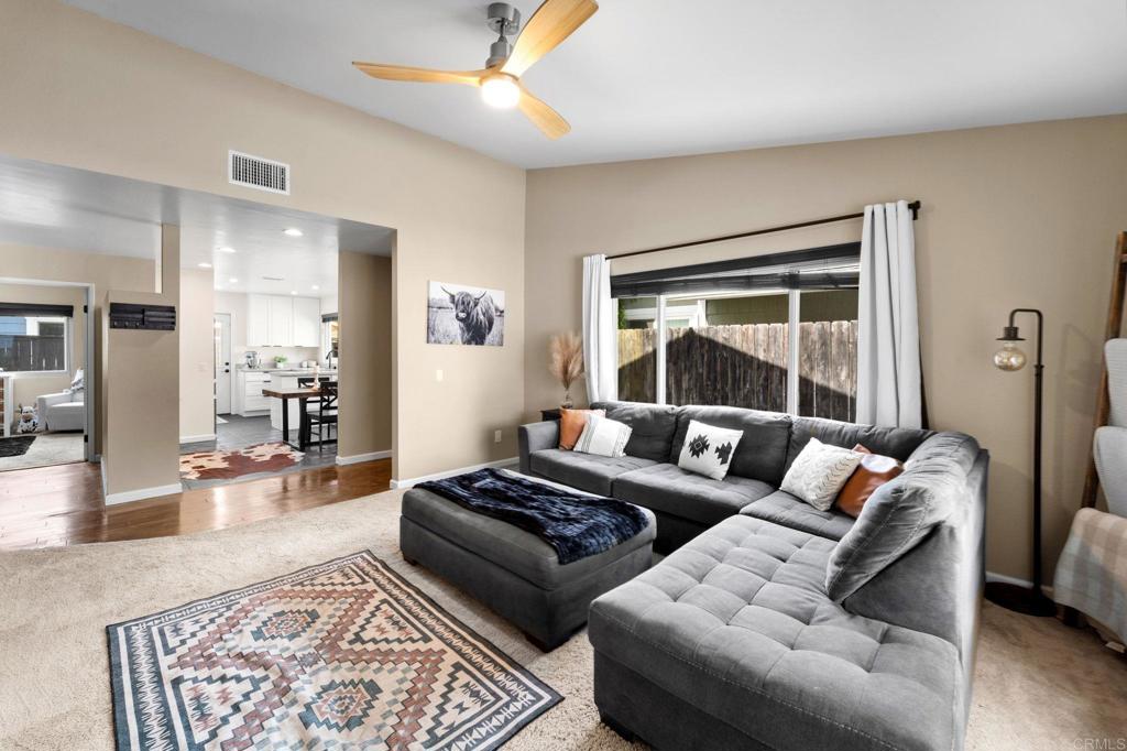 333 Sunflower Escondido, CA 92026 - Photo 17 of 36 a living room with furniture and a large window