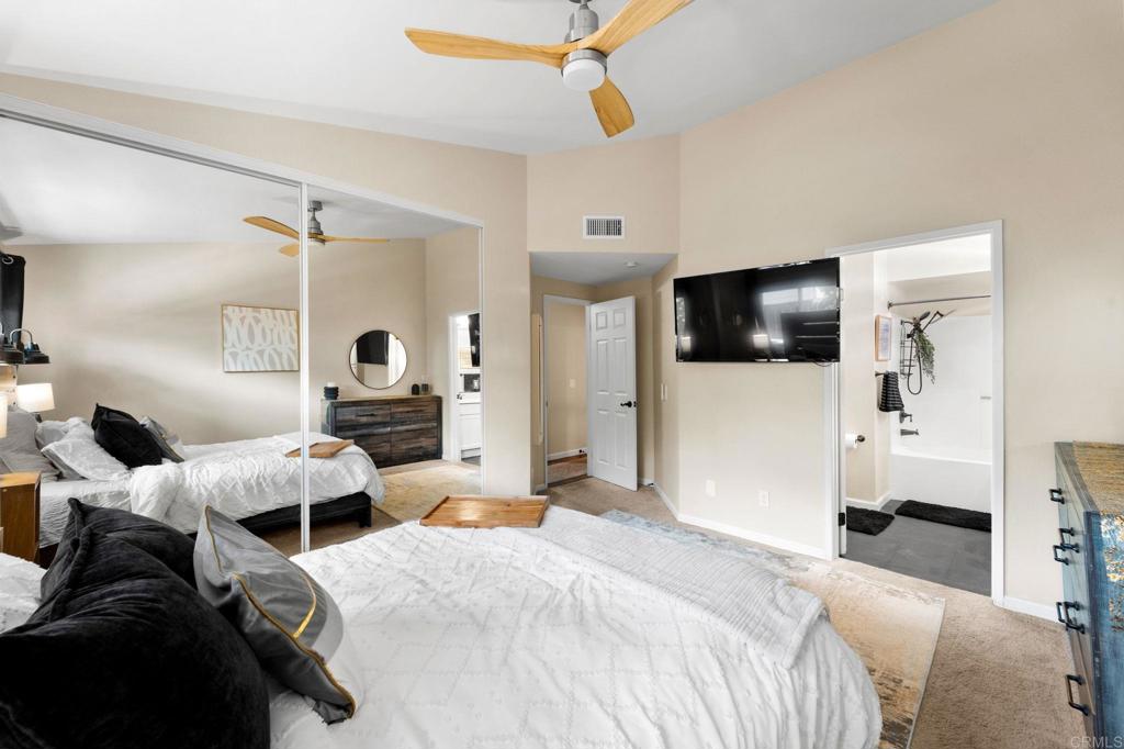333 Sunflower Escondido, CA 92026 - Photo 19 of 36 a bedroom with furniture and a flat screen tv