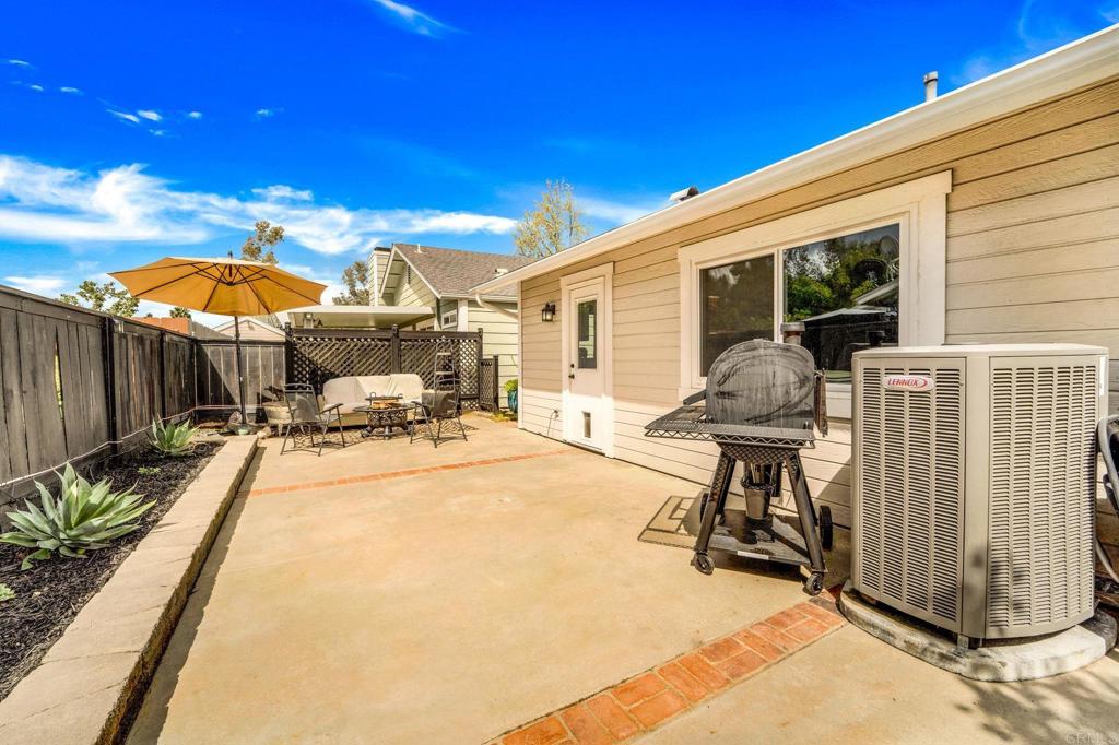 333 Sunflower Escondido, CA 92026 - Photo 28 of 36 a view of a patio with a table and chairs