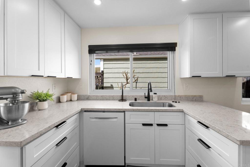 333 Sunflower Escondido, CA 92026 - Photo 8 of 36 a kitchen with sink cabinets and window