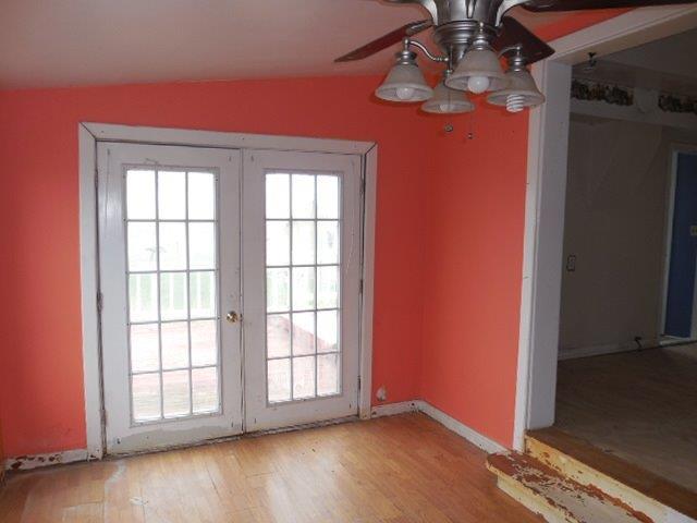 488 County Road 2100 North Danforth, IL 60930 - Photo 5 of 10 an empty room with wooden floor and windows